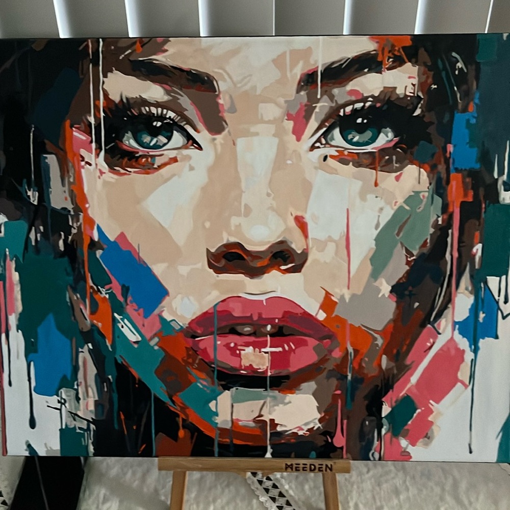 Woman face painting already framed